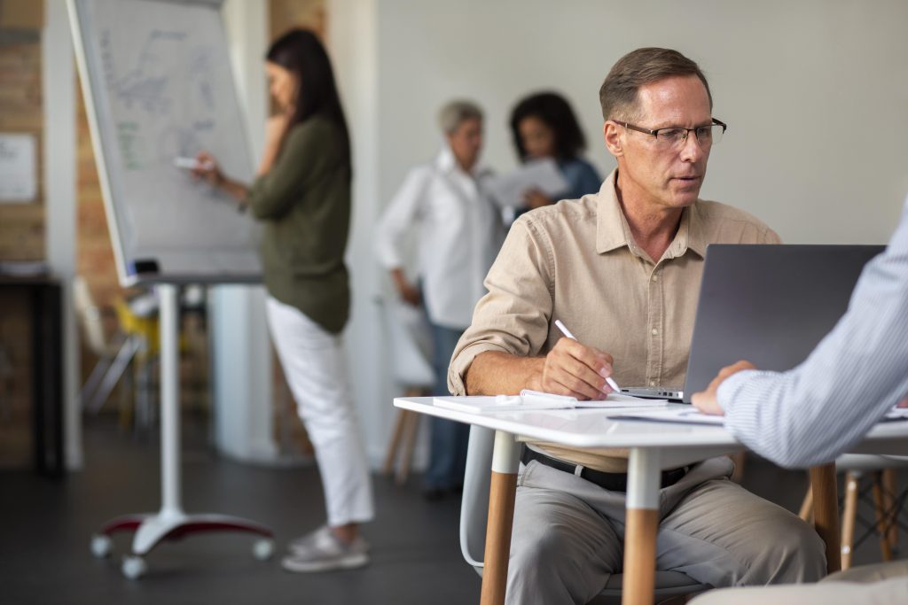 people-using-digital-device-while-meeting (2) (1)