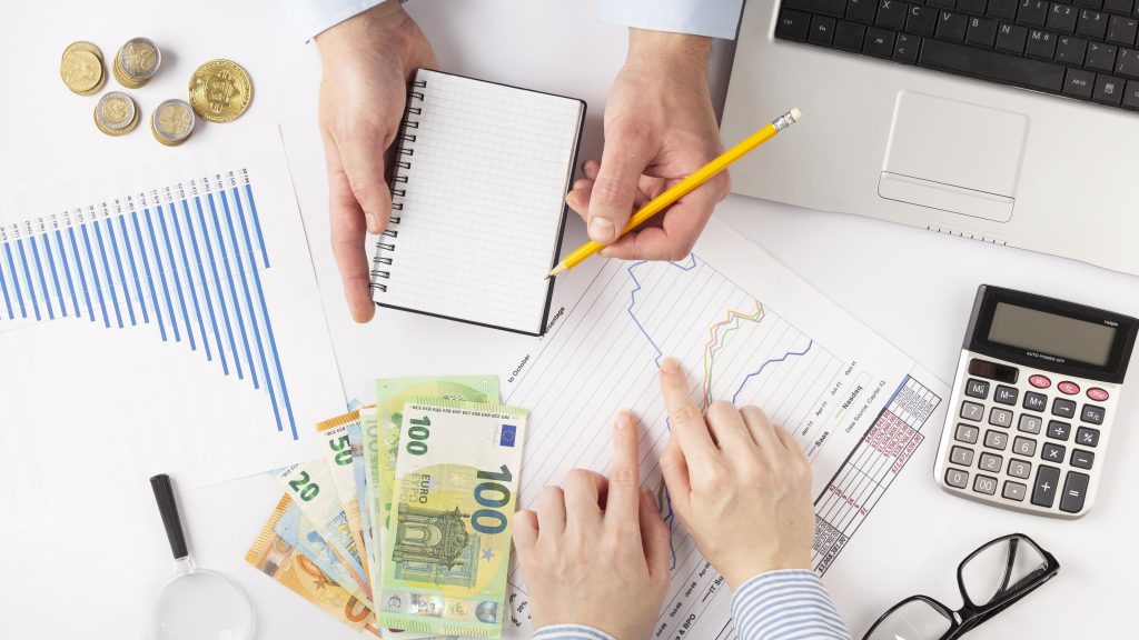 top-view-people-discussing-finances-manners (1)